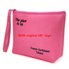 Bolsa cosmética de neopreno rosa con texto negro que dice 'The place to be' y el logo original de SB para viajar.