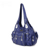 A dark blue vintage PU leather hobo shoulder bag with silver hardware and decorative floral embellishments.