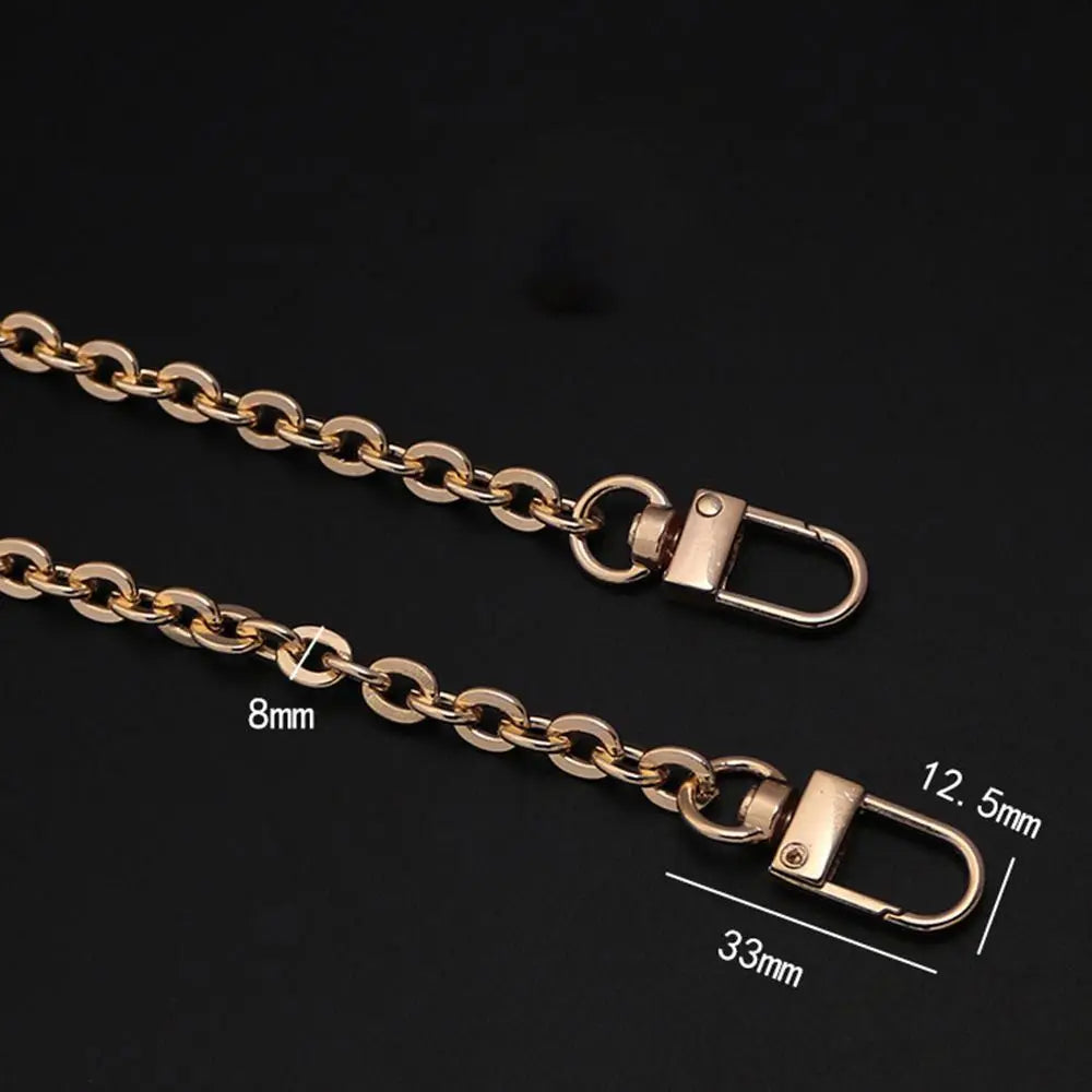 Gold-toned metal chain strap for an adjustable crossbody bag, showing various lengths and hardware.