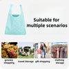 Light blue reusable supermarket shopping bag suitable for grocery shopping, travel storage, gift shopping, and clothing stora