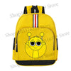 A yellow cartoon anime backpack featuring a smiling, round face with large eyes and antennae.