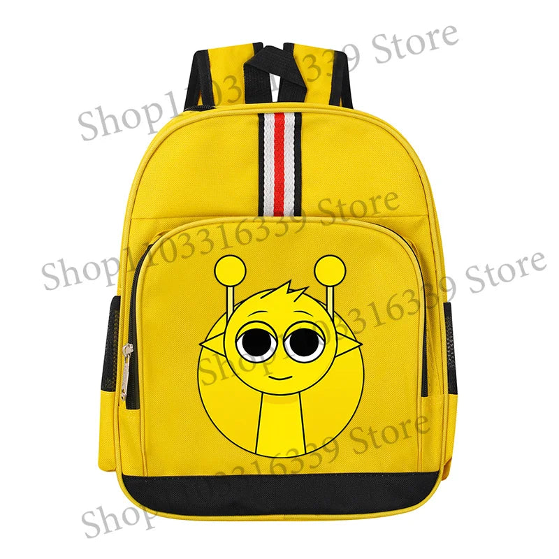 A yellow cartoon anime backpack featuring a smiling, round face with large eyes and antennae.