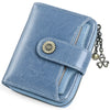 A light blue leather wallet with a clasp closure and card slots, featuring a decorative gold stud and a chain.