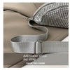 Silver rhinestone-embellished crossbody bag with a gray adjustable strap shown on a beige fabric.