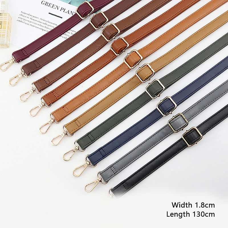 A collection of adjustable PU leather crossbody bag straps in various brown and navy colors shown laid out.
