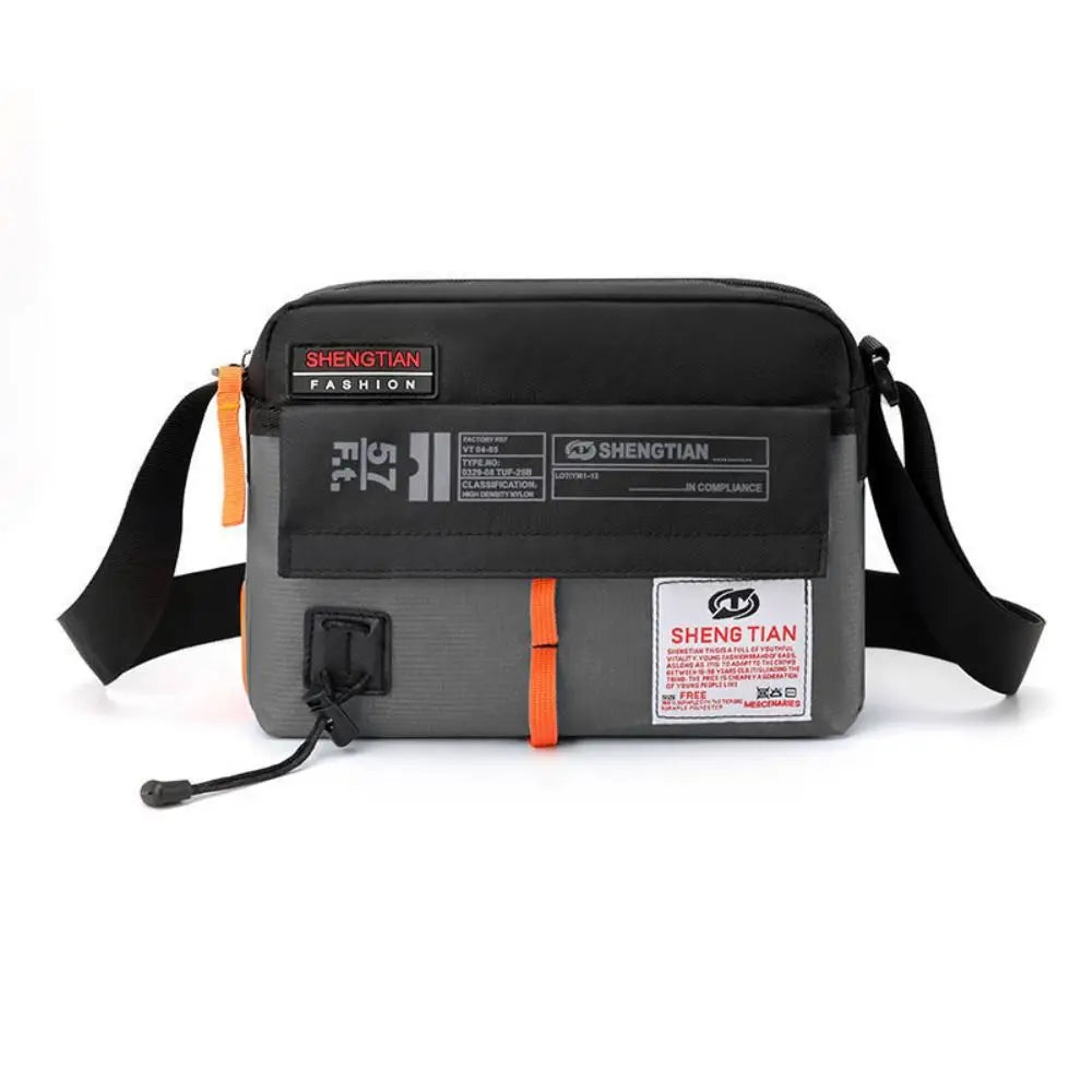 Black waterproof nylon crossbody bag with a flap and adjustable strap.