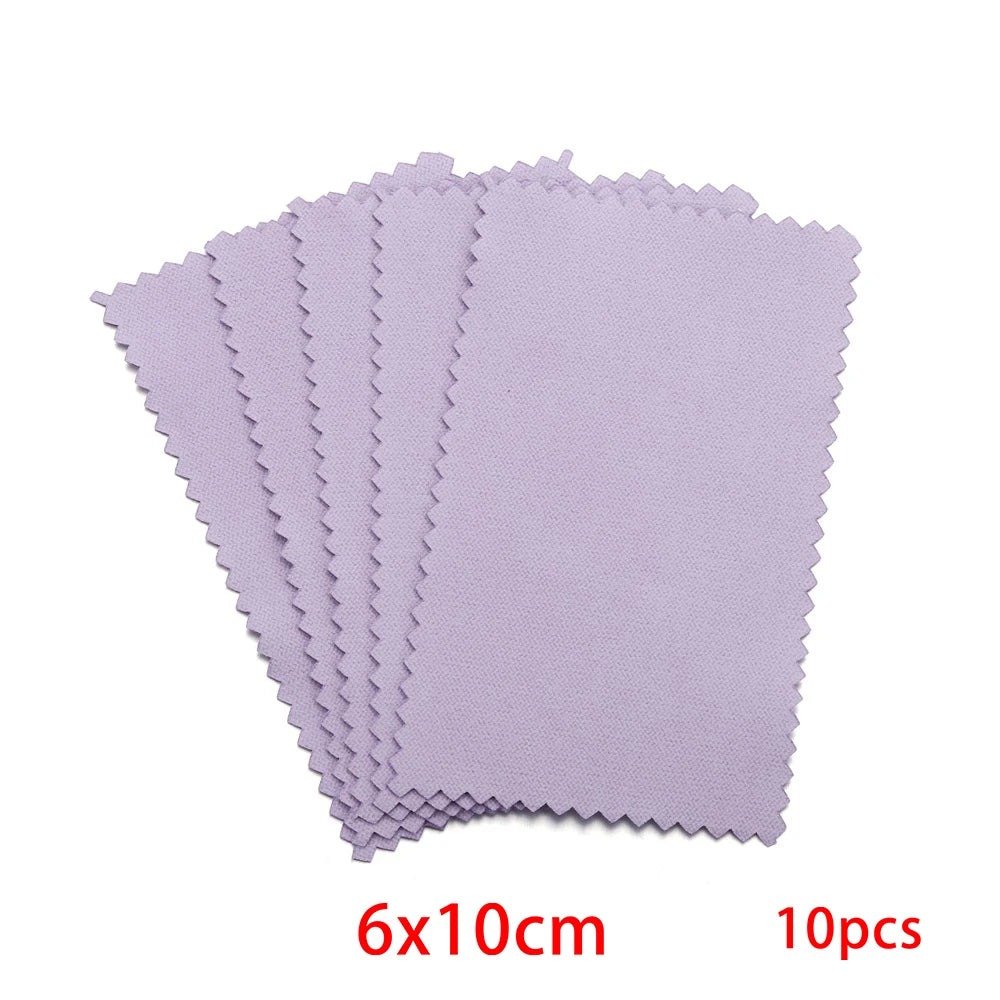A stack of purple polishing cloths for silver and gold jewelry, measuring 6x10cm, with 10 pieces.