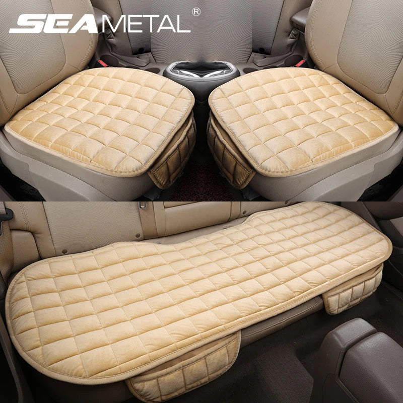Interior view of a vehicle showing plush beige seat covers installed on the front seats.