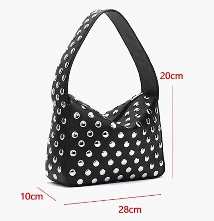 A black designer metal rivet shoulder bag with a polka dot pattern shown against a white background.