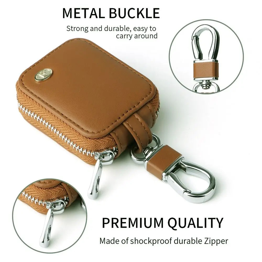 A brown leather metal buckle case with a zipper and attached keyring, showing its durable quality.