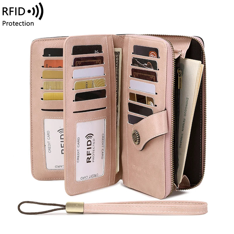 A light pink RFID protection multi-card wallet with a zipper and wrist strap is shown open.