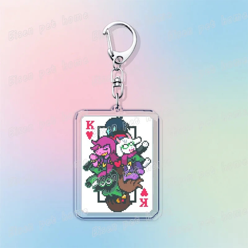 A silver keychain featuring a design of Deltarune chibi characters holding poker cards.