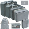 A set of gray fabric storage organizers and a matching drawstring bag for keeping items organized
