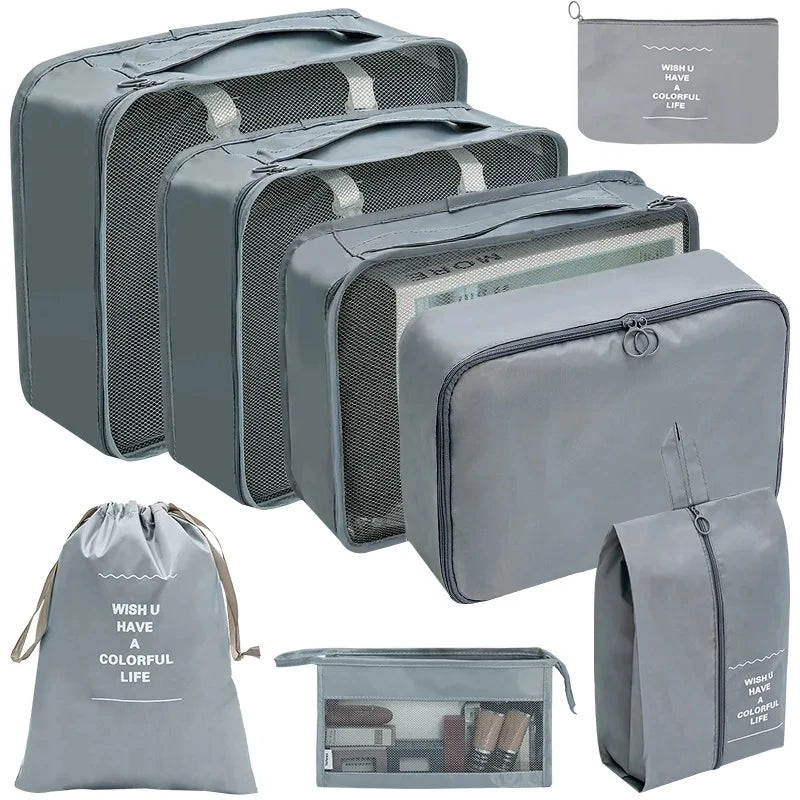 A set of gray fabric storage organizers and a matching drawstring bag for keeping items organized