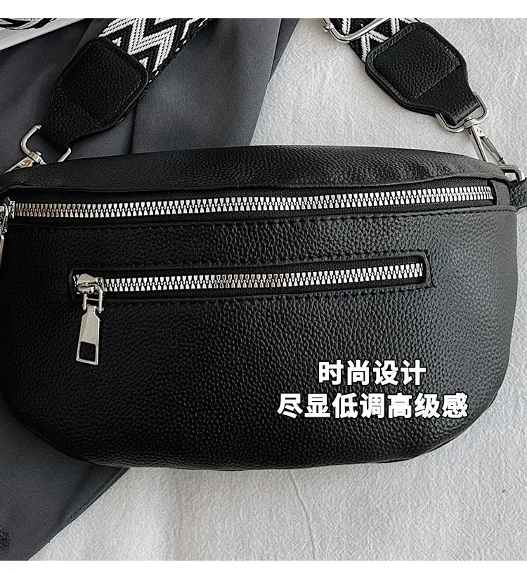 Black PU leather multi-pocket crossbody bag with silver hardware and black strap