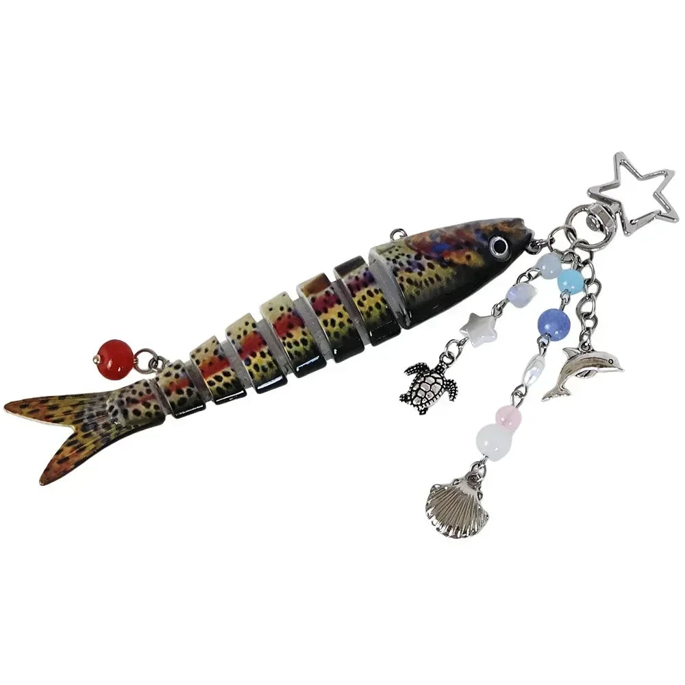 A simulation fish keychain featuring a colorful, patterned fish design with a silver charm and a star.