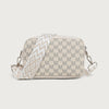 A beige crossbody bag with a chevron pattern and a matching strap.