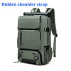 A close-up view of a gray travel backpack showing a hidden shoulder strap feature.