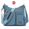 Hellblaue wasserdichte Nylon-Crossbody-Tasche mit mehreren Taschen und Trageriemen von vorne