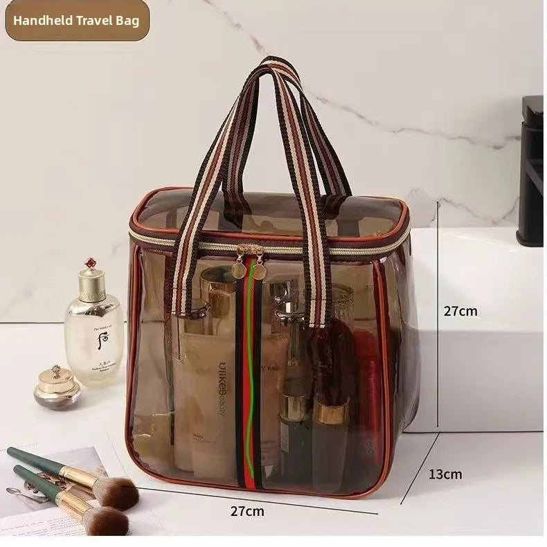 A clear waterproof toiletry bag with brown and black accents is shown next to various grooming tools.