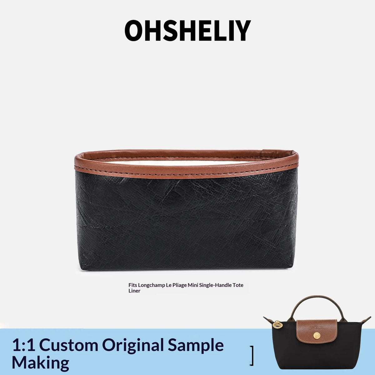 A black leather tote bag with a brown trim and a matching organizer insert.