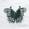 A dark green rhinestone butterfly applique sticker with intricate detailing.