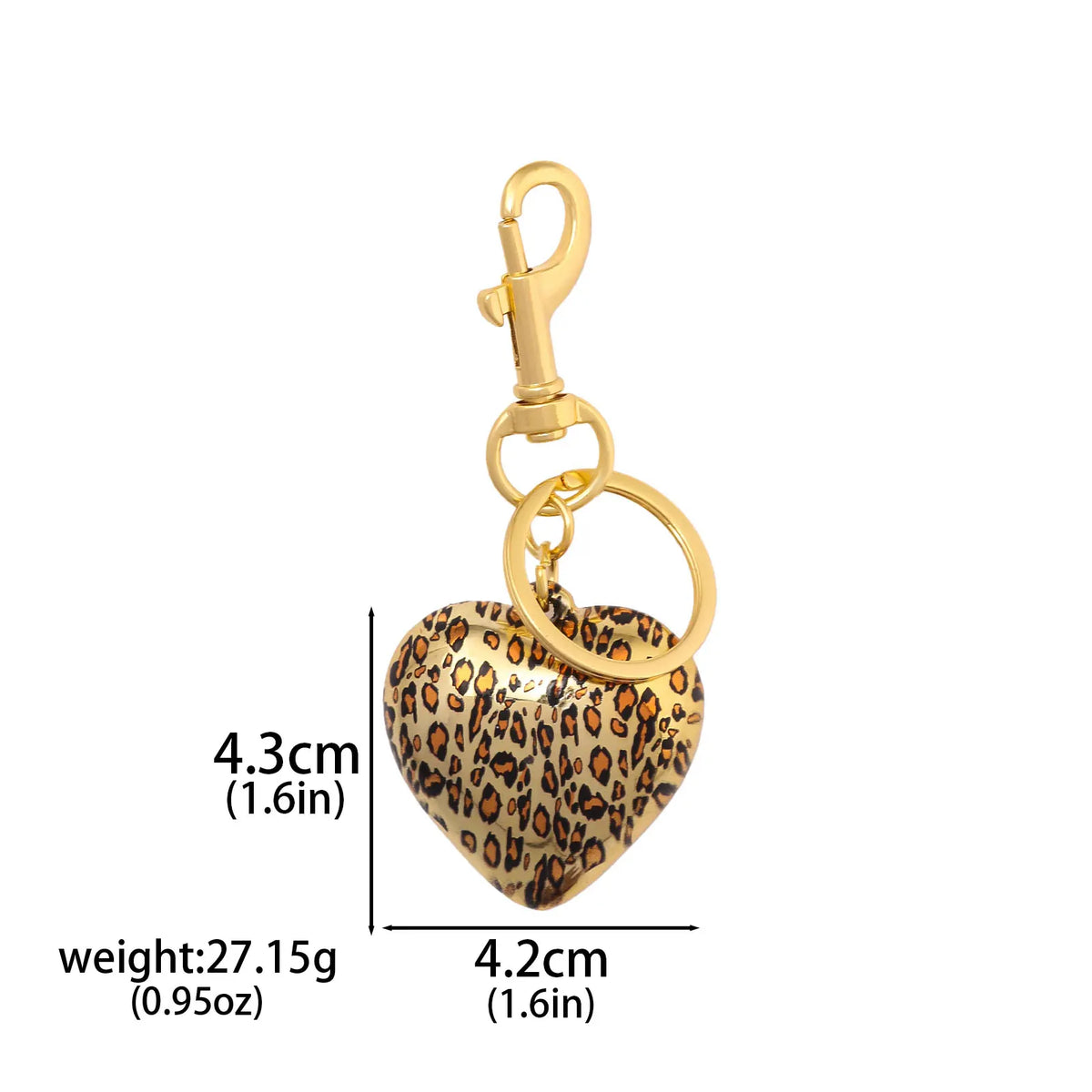 Gold-toned leopard print heart charm keychain with a bow detail.