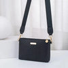 Black quilted leather crossbody bag with gold hardware and black strap