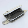 A beige Loungefly avatar zipper wallet with a gray lining and silver hardware.