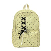 A light yellow corduroy backpack with a black bow print and drawstring closure.