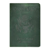 A dark green genuine leather passport holder embossed with the United States of America eagle design.
