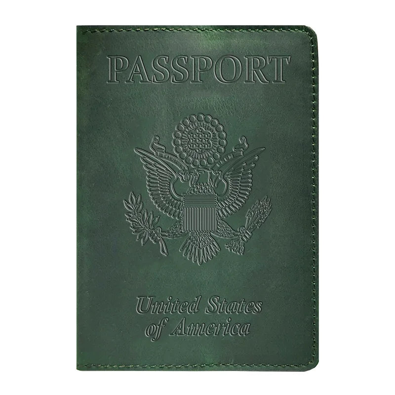 A dark green genuine leather passport holder embossed with the United States of America eagle design.