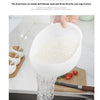 A white plastic drain basket is shown pouring liquid into a bowl, demonstrating its fine honey drain hole feature.