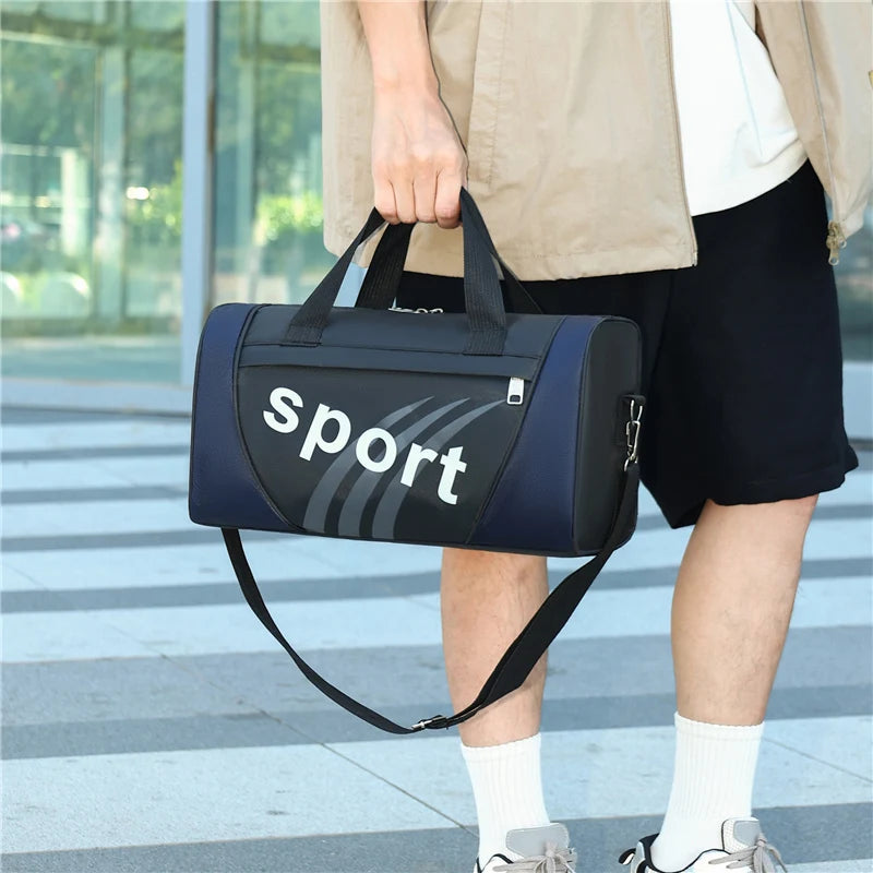A person is holding a dark blue and black sports backpack with a strap, standing outdoors.