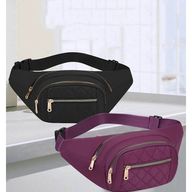 A pair of fashionable nylon crossbody belt bags in black and purple are displayed on a light surface.