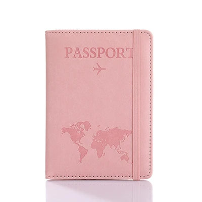 A pink leather passport organizer with a dove design and card slots.