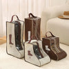 A set of brown and beige portable waterproof boot storage bags displayed on a light-colored rug.