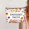 Bolsa de almacenamiento de cosméticos rosa con un patrón de dulces y golosinas para emergencias.
