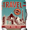 A teal suitcase with a red label featuring the word TRAVEL and text encouraging enjoyment of the stay.