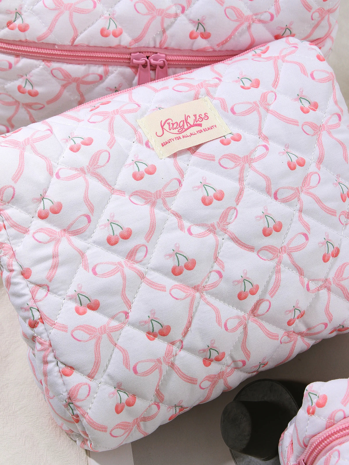 Pinkes, gestepptes Make-up-Aufbewahrungstasche mit rosa Schleifedetail