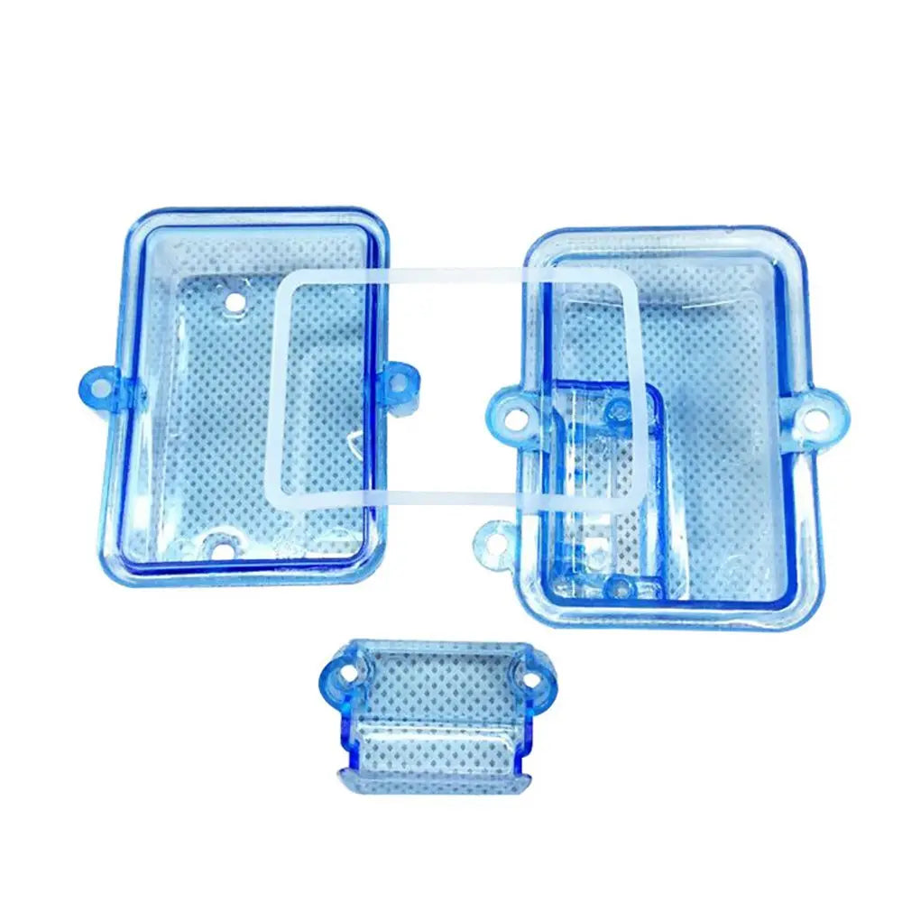 A set of clear blue waterproof receiver protection boxes for RC cars.