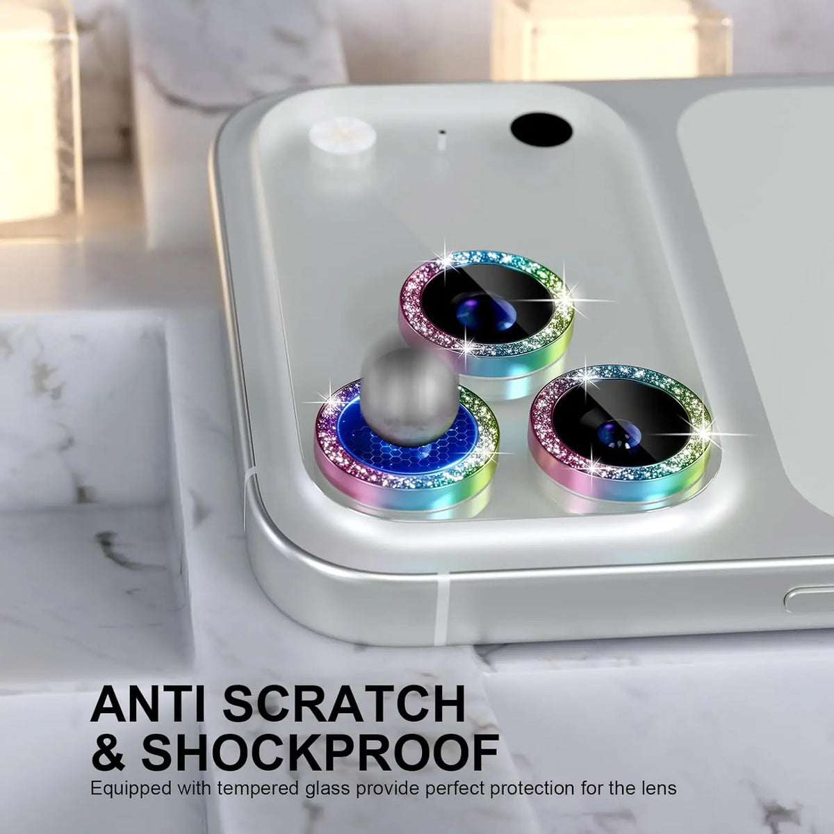 Glitter diamond camera lens protector with metal frame for iPhone shown in a case.