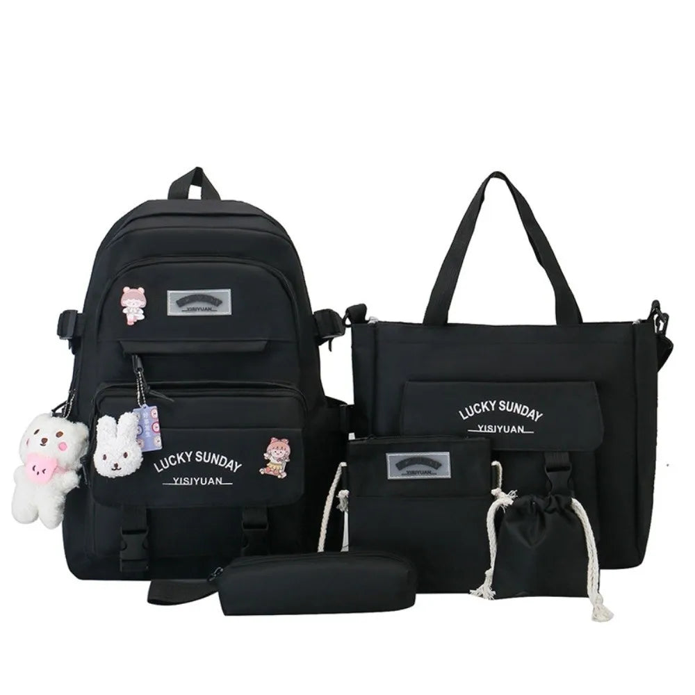 Black nylon backpack set for students featuring cartoon designs and accessories