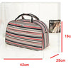 A striped black and white PU leather travel duffel bag with a handle, shown against a white background.