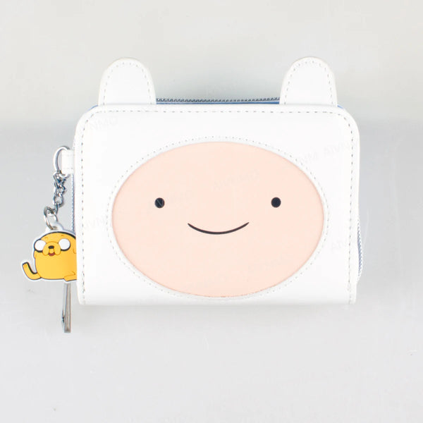 A white leather wallet featuring a round, smiling face design and a yellow charm.
