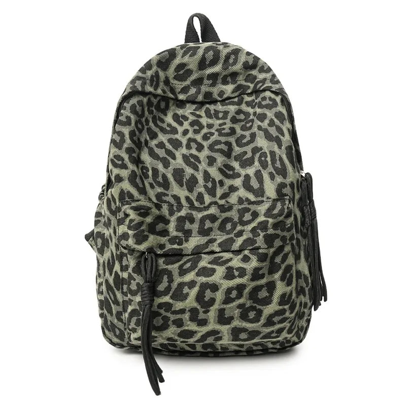 A camouflage leopard print canvas backpack for women.