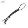 A close-up of a dark green and pink 7-strand paracord keychain with a loop and dangling strands.