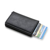 Portefeuille mince noir avec protection RFID, contenant plusieurs cartes de crédit visibles.