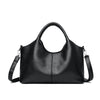 A black leather women's casual crossbody shoulder bag with a zip closure.