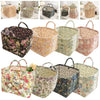 A collection of quilted fabric storage baskets in various floral patterns and colors.